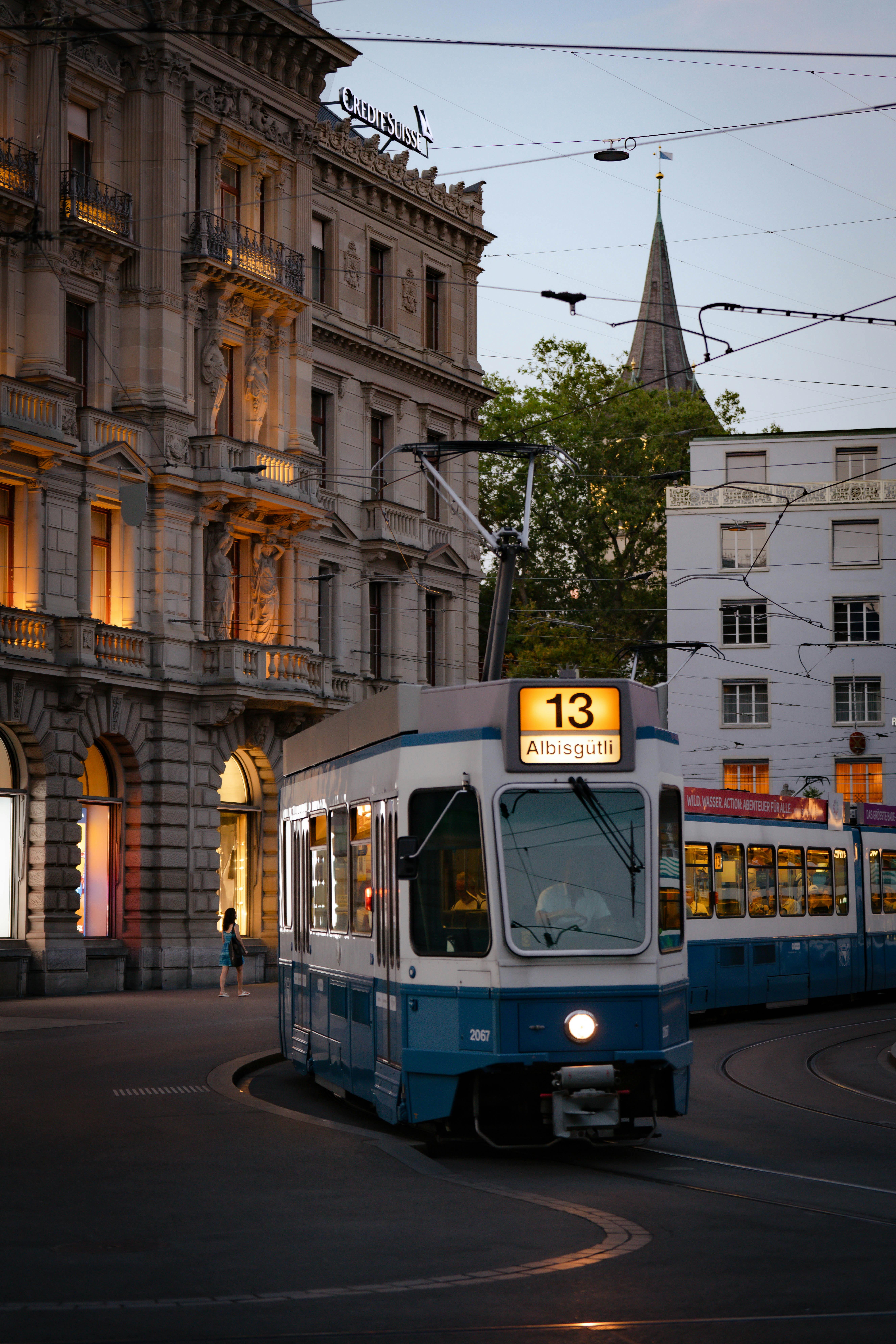 Morning trams by the Limmat